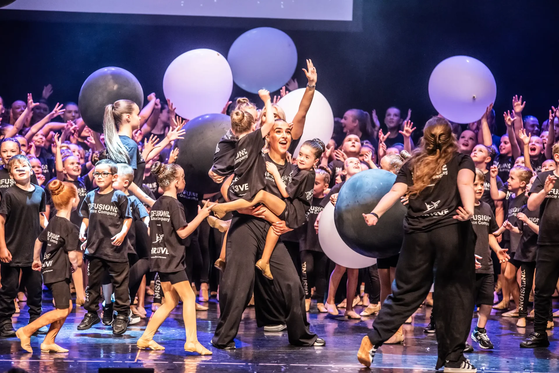 Infusion Dance Company dancers on stage